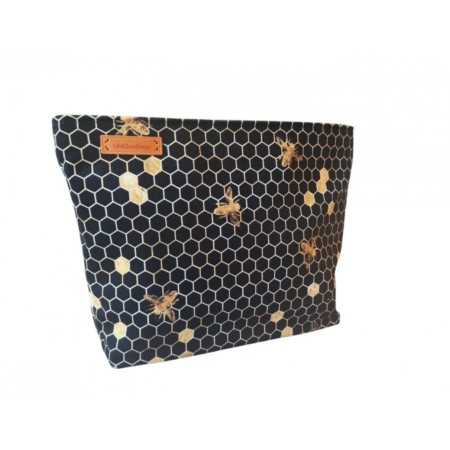 Duża welurowa kosmetyczka w złote pszczoły.