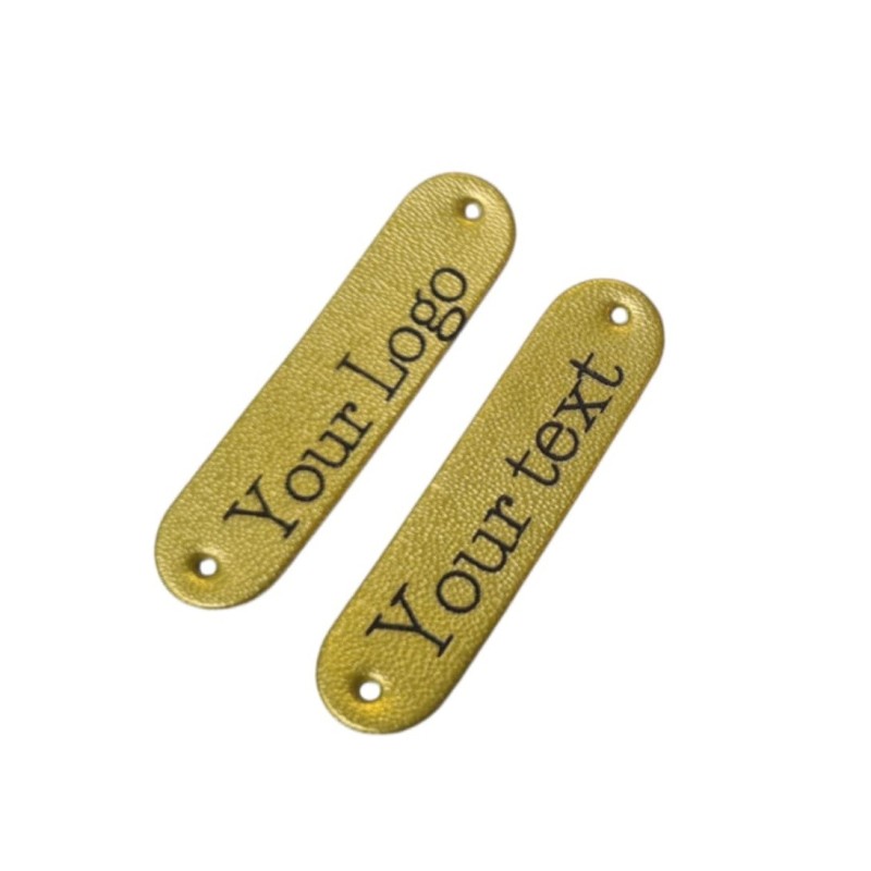 Personalizowane złote metki z eko- skóry z Twoim logo